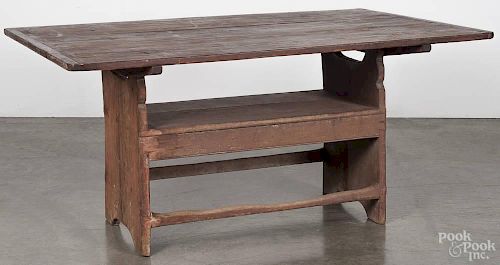 Pennsylvania pine bench table, 19th c., retaining a red wash, 27 1/2'' h., 58 1/2'' w., 36'' d.