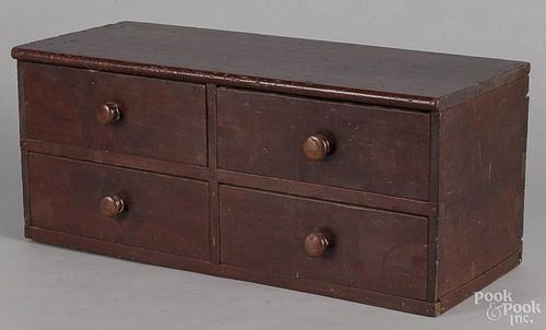 Pennsylvania pine drawered cabinet, 19th c., retaining a red stain, 9 1/2'' h., 22 1/4'' w., 9'' d.