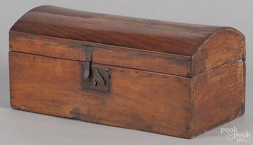 New England pine dome top box, 19th c., with initials H C on a painted panel on the lid, 8 1/4'' h.