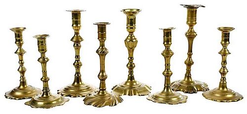 Eight Georgian Brass Candlesticks