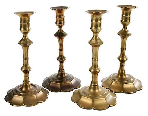 Four Georgian Brass or Bell Metal Candlesticks