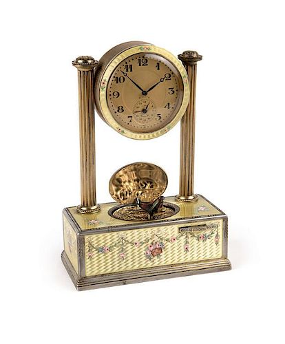 A Swiss silver & enamel singing bird box with clock