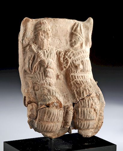 Mesopotamian Terracotta Relief with Seated Figures for sale at auction on  11th July | Bidsquare