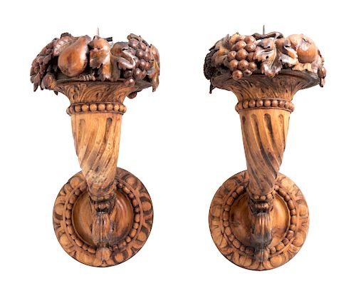 A Pair of Continental Carved Fruitwood Sconces