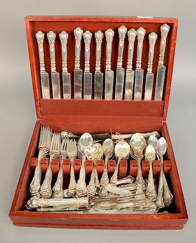Sterling silver flatware set for eleven to include twelve dinner forks, thirteen luncheon forks, eleven salad forks, twelve cock...