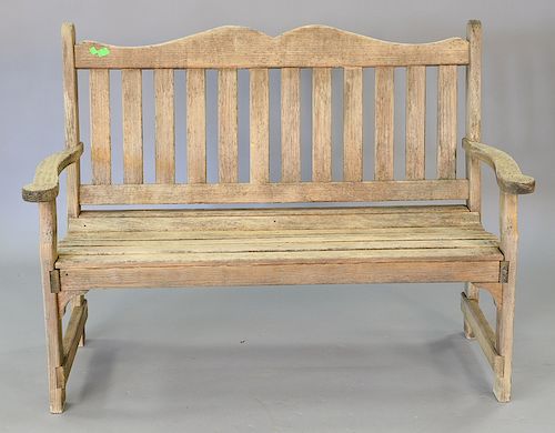 Outdoor bench made of pressure treated wood. ht. 39 1/2in., wd. 54 in.