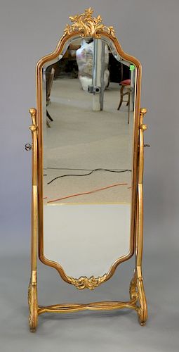 Louis XV style gilt decorated cheval mirror. ht. 69 in., wd. 28 in.