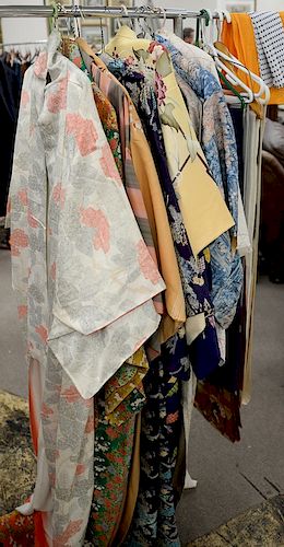 Lot of ten women's silk kimonos, along with six silk shawls.