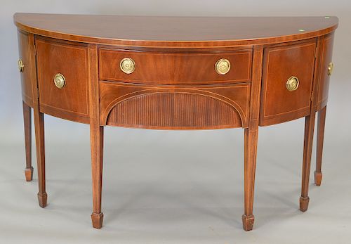 Baker mahogany half round sideboard with line inlay. ht. 37 in., wd. 66 in., dp. 27 1/2 in.