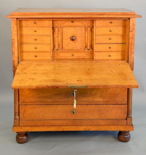 Cherry secretary abattant with drawered interior on bunn feet, early 19th century. ht. 49 1/2 in., wd. 47 1/2 in.