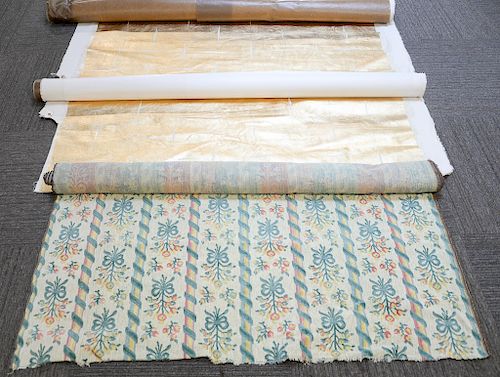 Group of four rolls of fabric/wallpaper; three rolls of gold leaf, possibly Scalamandre; along with a mixed blend of tapestry roll (...