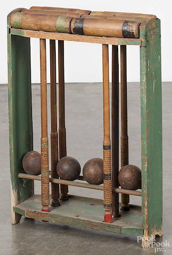 Painted wood croquet set, early 20th c., 28'' h.