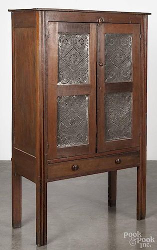 Pennsylvania pine pie safe, 19th c., with geometric punched tin panels, 58 1/4'' h., 33 1/2'' w.