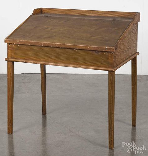 Painted pine slant front work desk, 19th c., with a yellow grained surface, 33'' h., 31 1/2'' w.