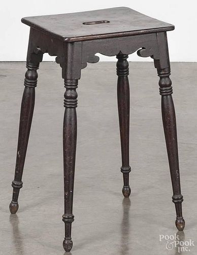 Victorian walnut work stand, 19th c., with a scrolled apron and turned legs, 22 1/4'' h., 13'' w.