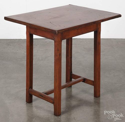 Stained pine work table, early 19th c., with a stretcher base, 26'' h., 26 1/2'' w., 22 1/2'' d.