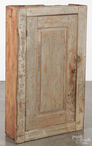Painted pine wall cupboard, early 19th c., retaining a scrubbed surface, 41 1/2'' h., 26'' w.