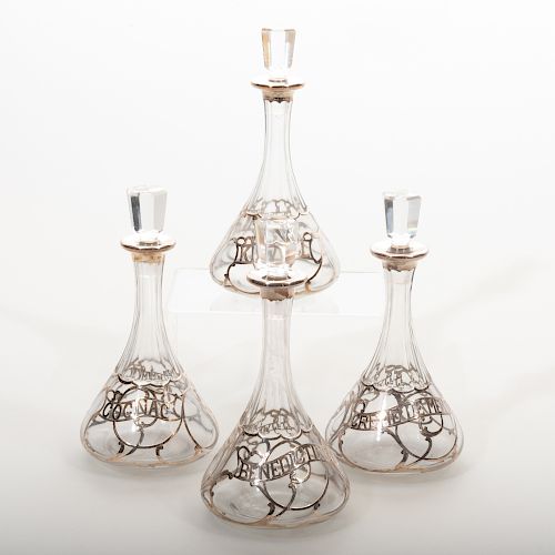 Set of Four Alvin Corporation Silver Overlay Glass Decanters and Stoppers