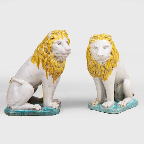 Pair of Continental Glazed Faience Lions, Possibly French