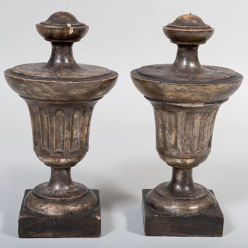 Pair of Grey Painted and Silver-Gilt Wood Finials