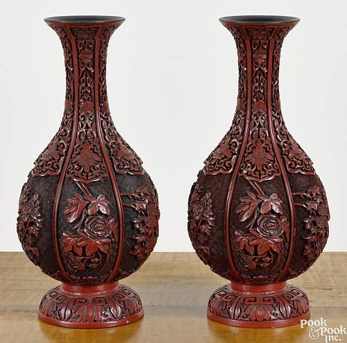 Pair of Chinese cinnabar vases, 19th c., with lobed bodies and floral decoration