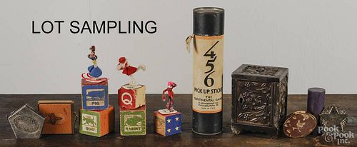 Group of miscellaneous toys, to include a J. & E. Stevens cast iron safe bank, wooden blocks