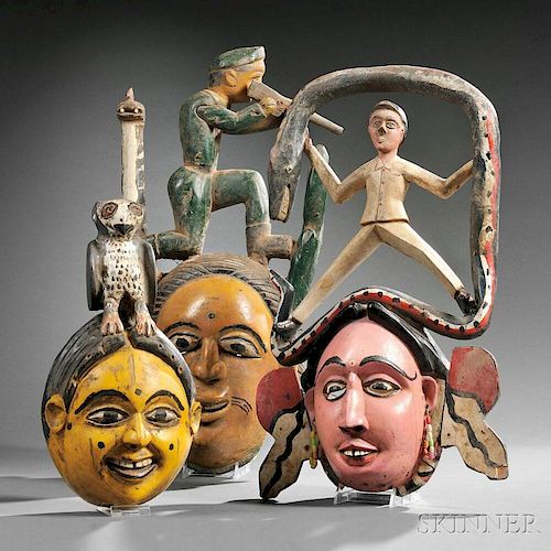 Three Polychrome Carved Wood Ibibio Face Masks