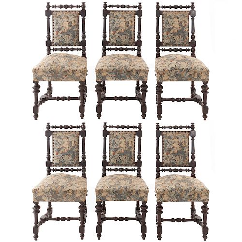 Lote de 6 sillas. Francia. Siglo XX. Estilo Enrique II. En talla de madera de nogal. Con respaldos semiabiertos y asientos en tapicería