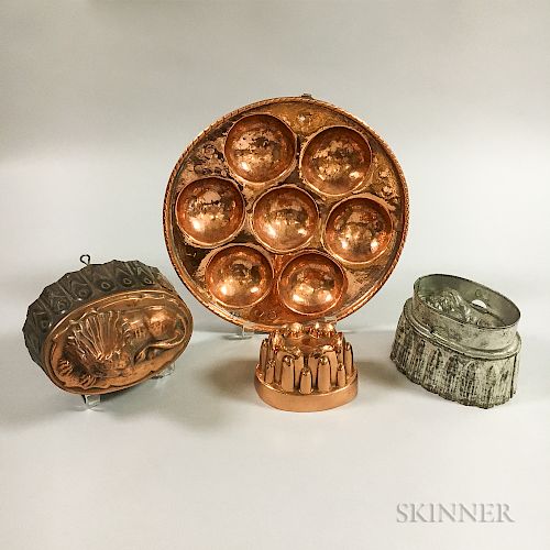 Tin and Three Copper Food Molds.  Estimate $100-150