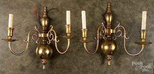 Pair of cast brass wall sconces