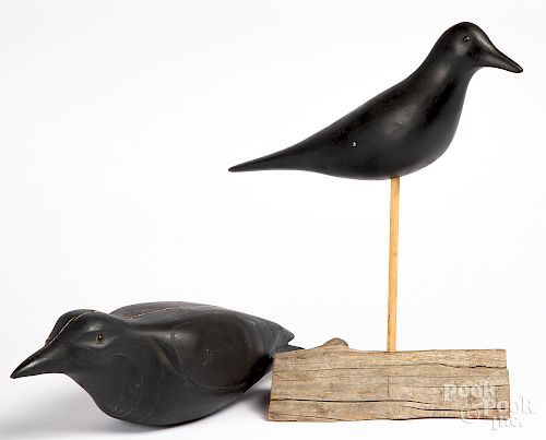 Two carved and painted crow decoys