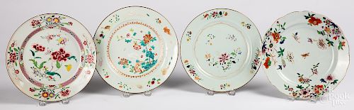Four Chinese export porcelain famille rose plates