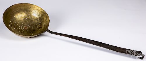 Oversize wrought iron and brass straining ladle
