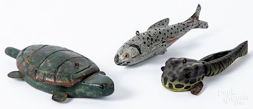 Three carved and painted ice fishing decoys