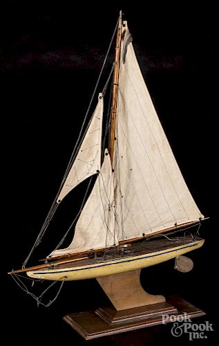 Painted pond model sailboat