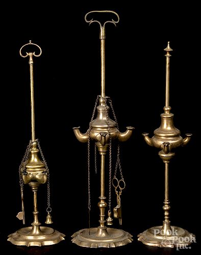 Three brass oil lamps