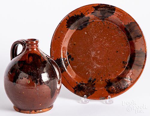 Redware ovoid jug and plate