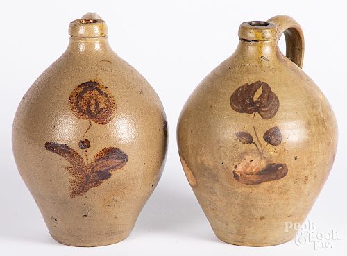 Two similar stoneware jugs
