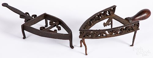 Two wrought iron trivets