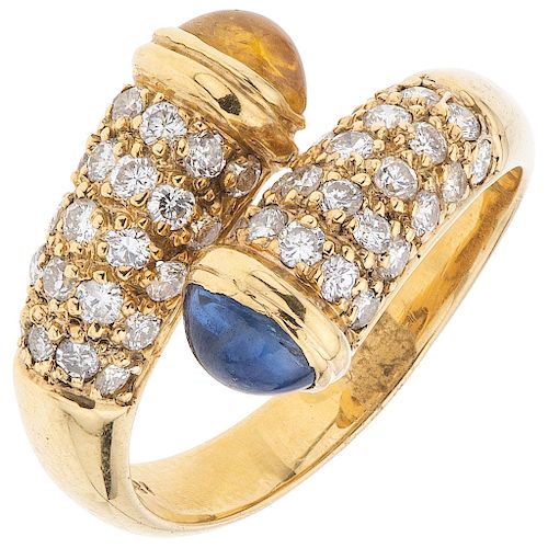 A sapphire and diamond 18K yellow gold ring.