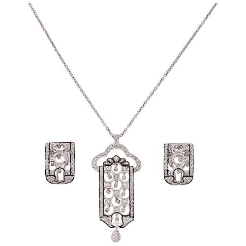 A diamond 14K white gold choker, pendant and pair of earrings set.