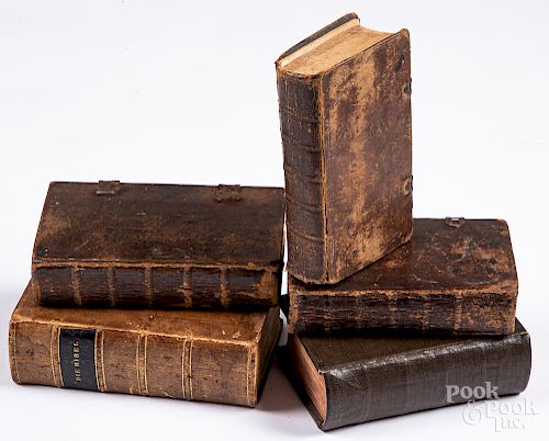 Five leather bound religious texts