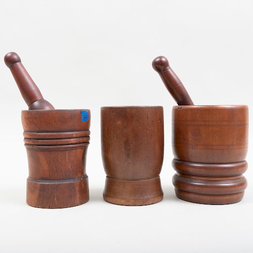 Three Carved Wood Mortars and Two Pestles