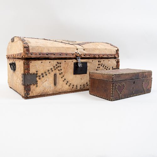 Pony Skin Trunk with Studded Decoration and a Leather Table Box with Studded Decoration