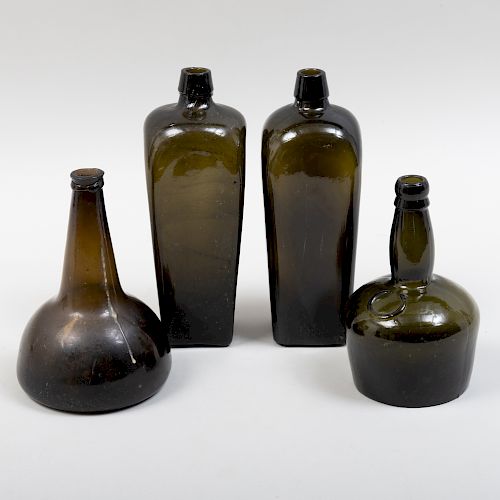 Group of Four Glass Gin Bottles