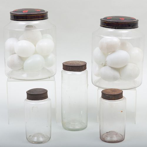 Group of Five Blown Glass Storage Jars with Metal Lids