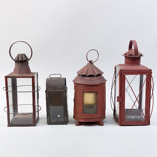 Group of Four Tin and Glass Candle Lanterns