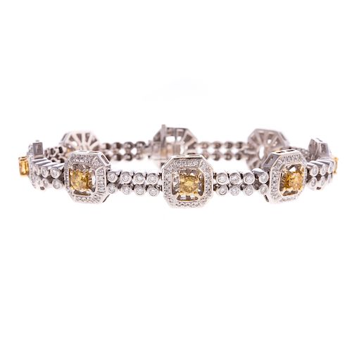 A Ladies Yellow & White Diamond Bracelet in 18K