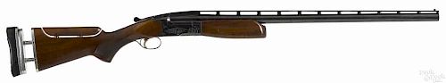 Browning Invector BT-99 shotgun, 12 gauge, with an elevated vented rib barrel, a pistol grip stock