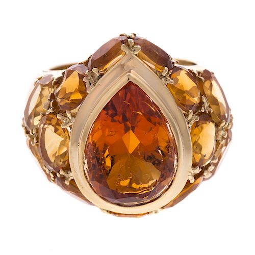 A Ladies Fine Imperial Topaz Ring in 18K Gold